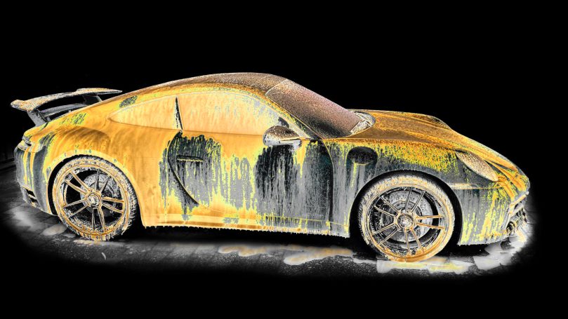 911 Carat Gold Porsche 992 GTS covered in gold snow foam, by Denis Taylor