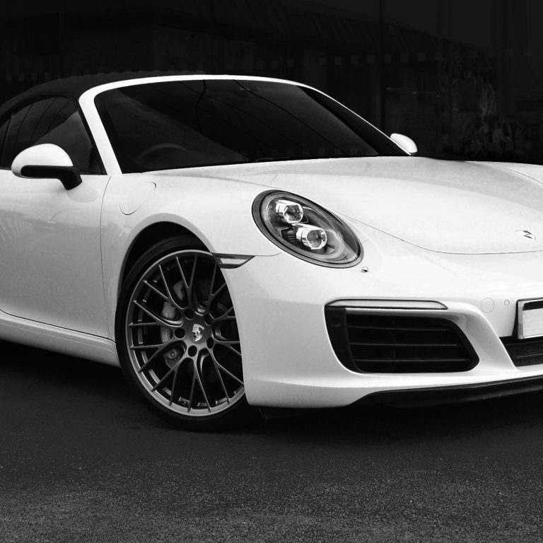 White 911 convertible, by Denis Taylor
