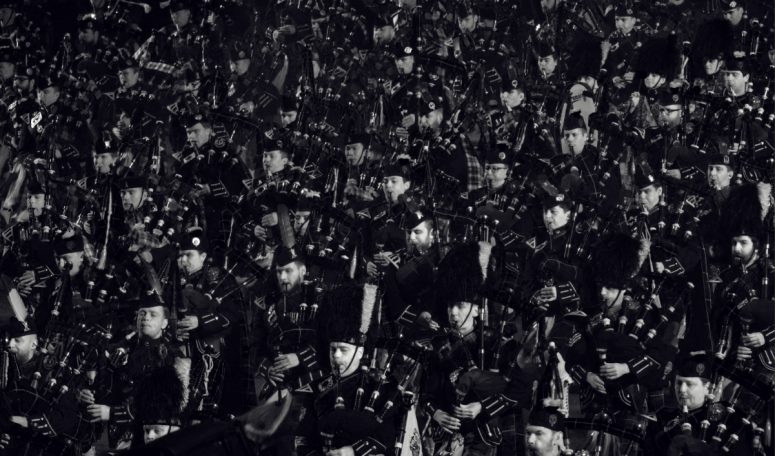 Blow Very close crop of the mass band of pipers at Edinburgh Castle, by Denis Taylor